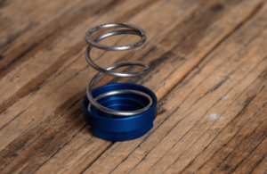 R BRAKE RETURN SPRING, BETA BLUE